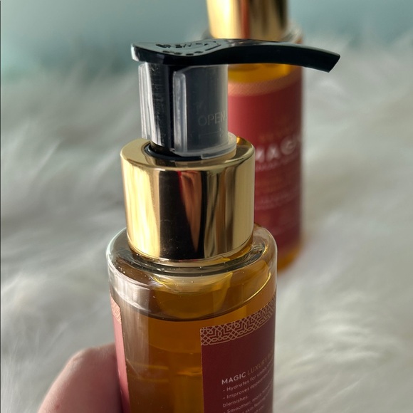Two bottles of Besque Magic Body Oil - Brown - Picture 4 of 5